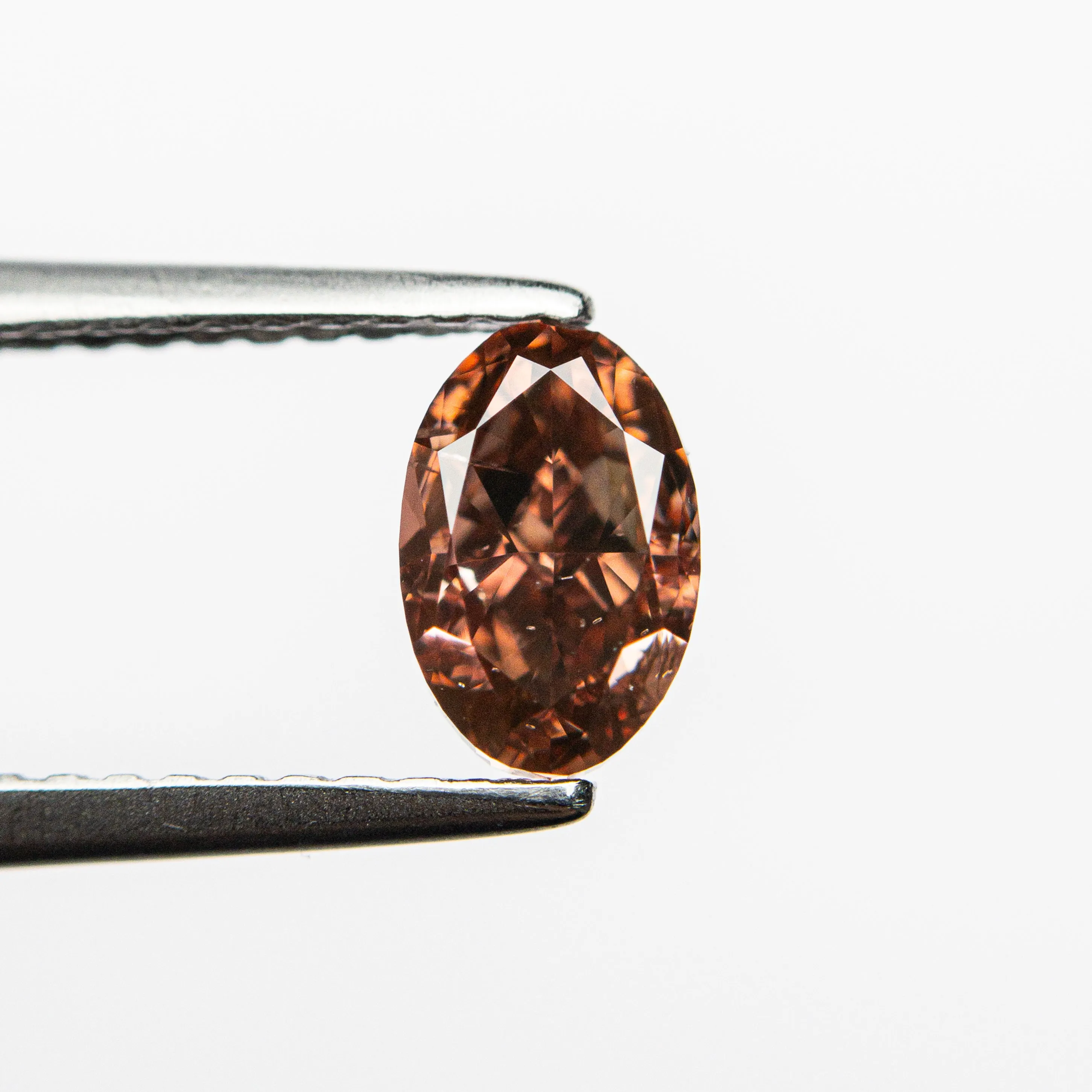 0.80ct 6.64x4.33x3.25mm GIA SI2 Fancy Deep Brownish Orangy Pink Oval Brilliant  24162-01