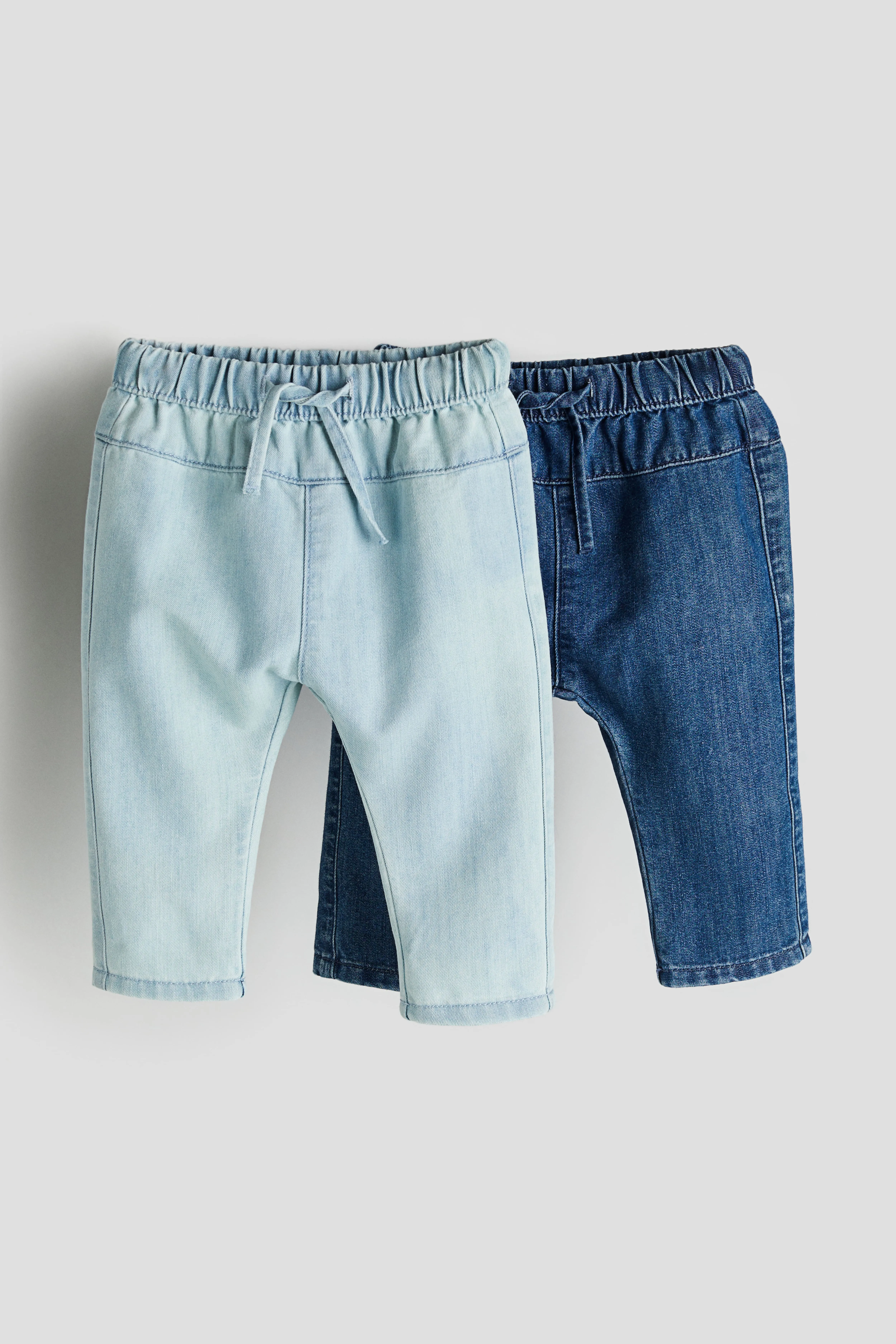 2-pack Tapered Leg Jeans - Regular waist - Long - Light denim blue/Denim blue - Kids | H&M GB