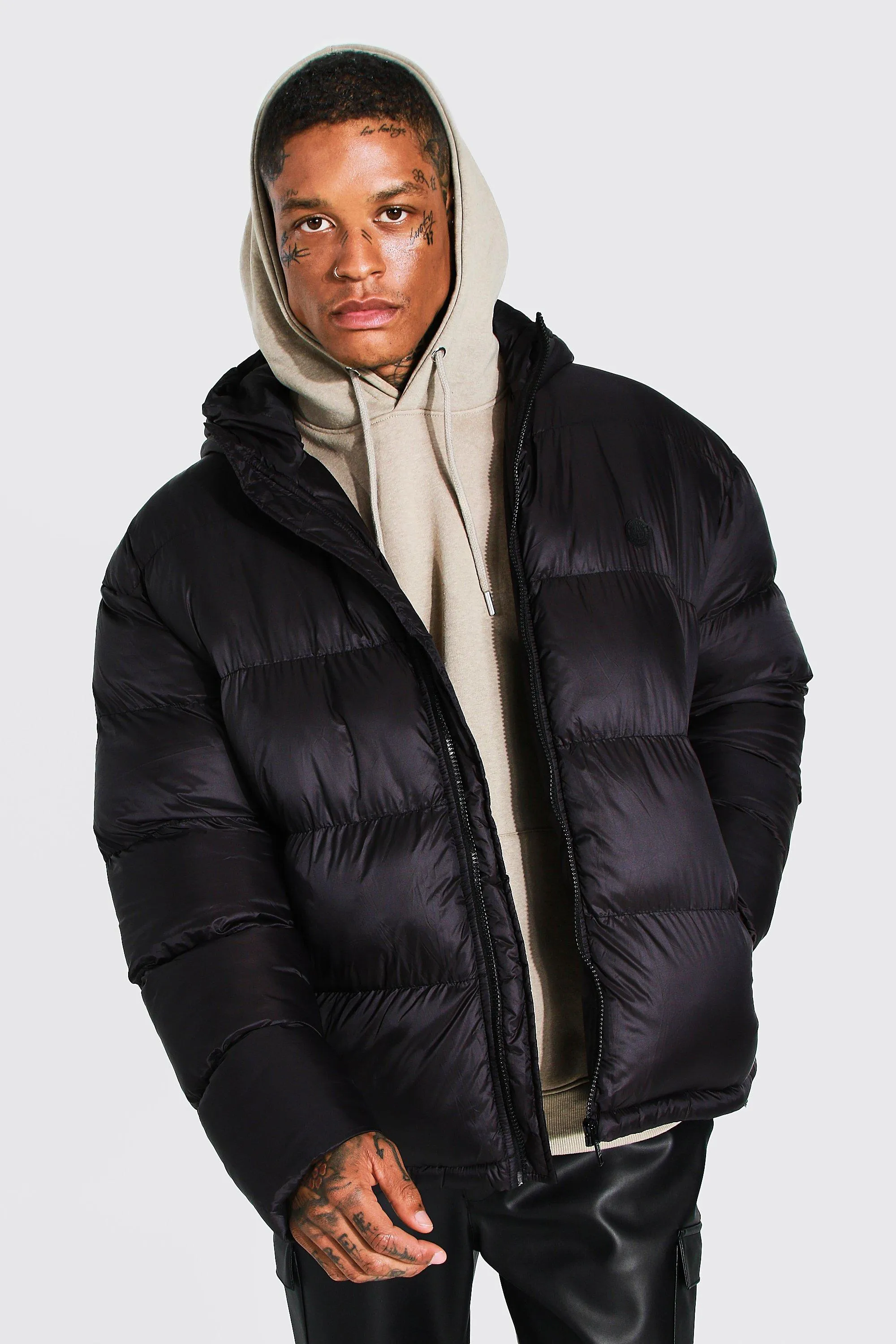Oversized Man Hanfilled Curved Hem Puffer