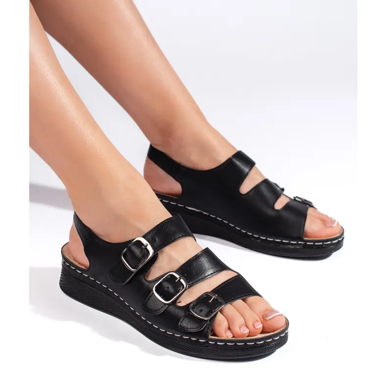 Women's black sandals with buckles